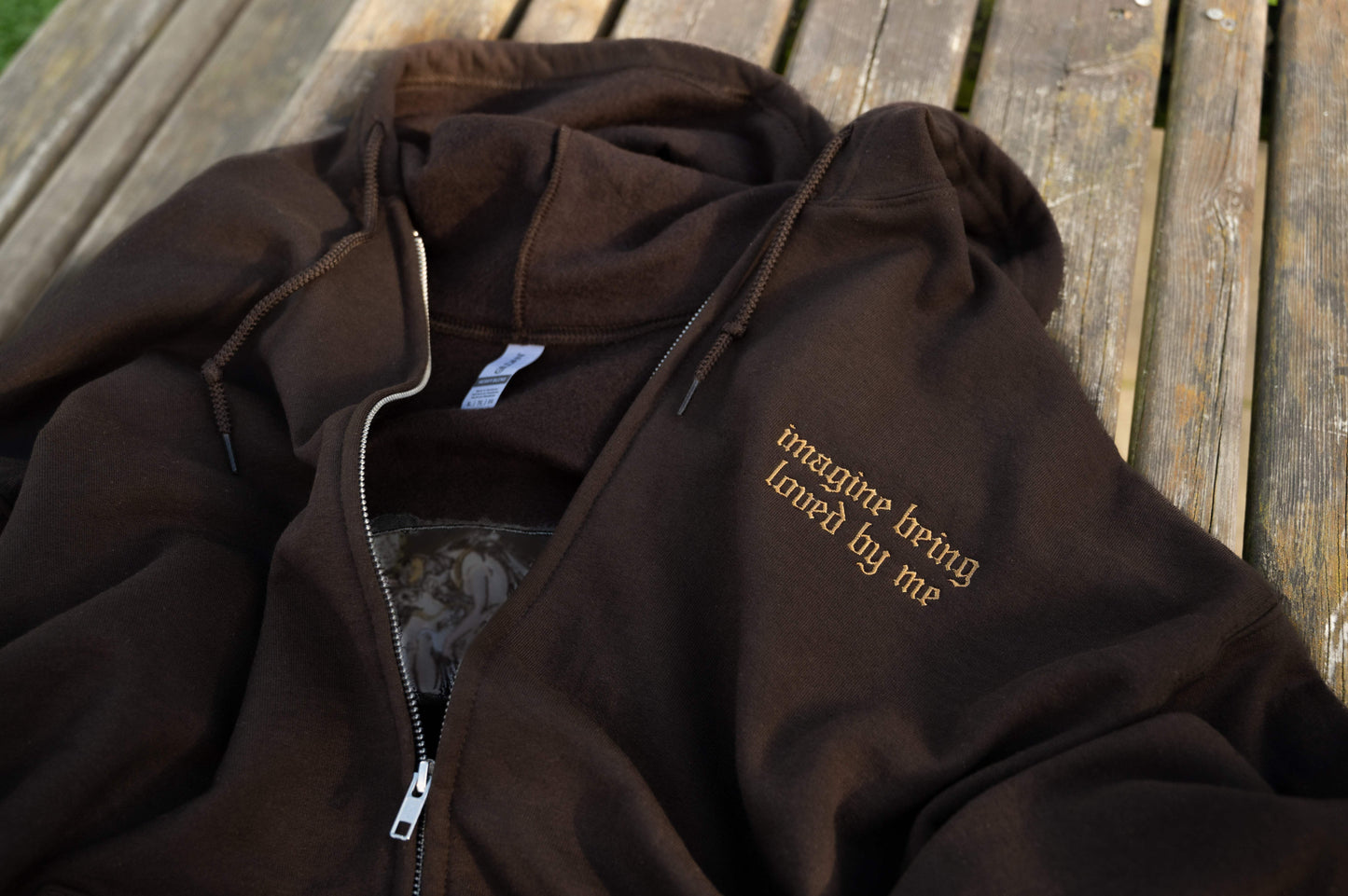Hand-embroidered brown zip up hoodie front flat lay - Hozier lyric imagine being loved by me merch