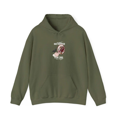 Mockup of a Noah Kahan Heart and Soul embroidered hoodie in olive green - my heart has changed and my soul has changed 