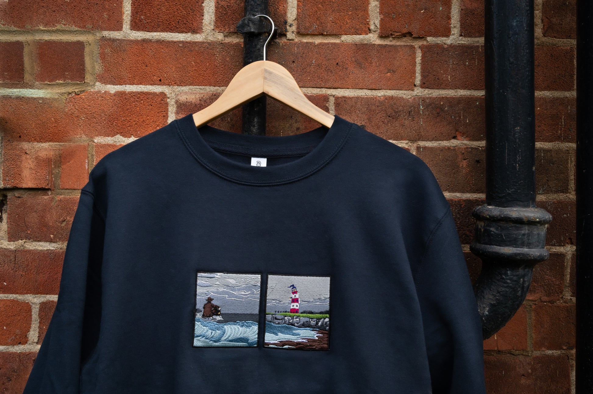 the ghost on the shore lord huron embroidered navy sweatshirt - hanger view 