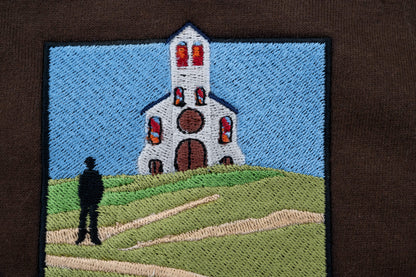 Embroidery closeup of The Great Divide stained glass design zip up hoodie in brown - noah kahan concert outfit 