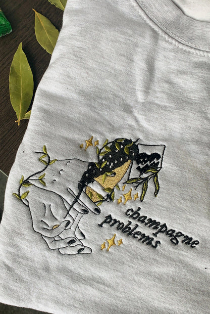 The Champagne Problems Sweatshirt or T Shirt